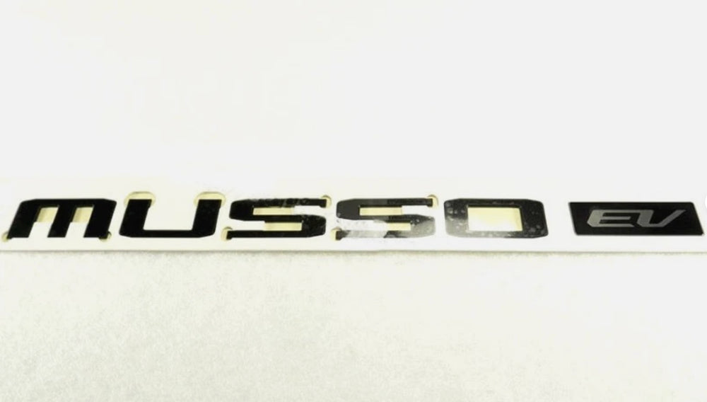2025 2026 KGM Musso EV pick-up OEM Rear Black Deck MUSSO EV Letter Emblem